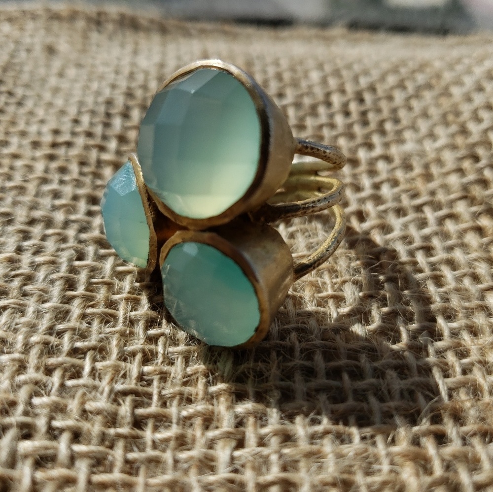 Soixante neuf jewel triple-cluster ring